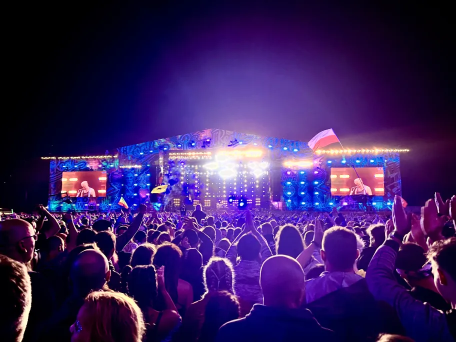 Crowd at concert, purple lights