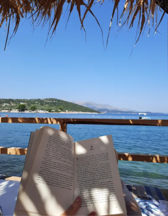 Reading a book on the beach